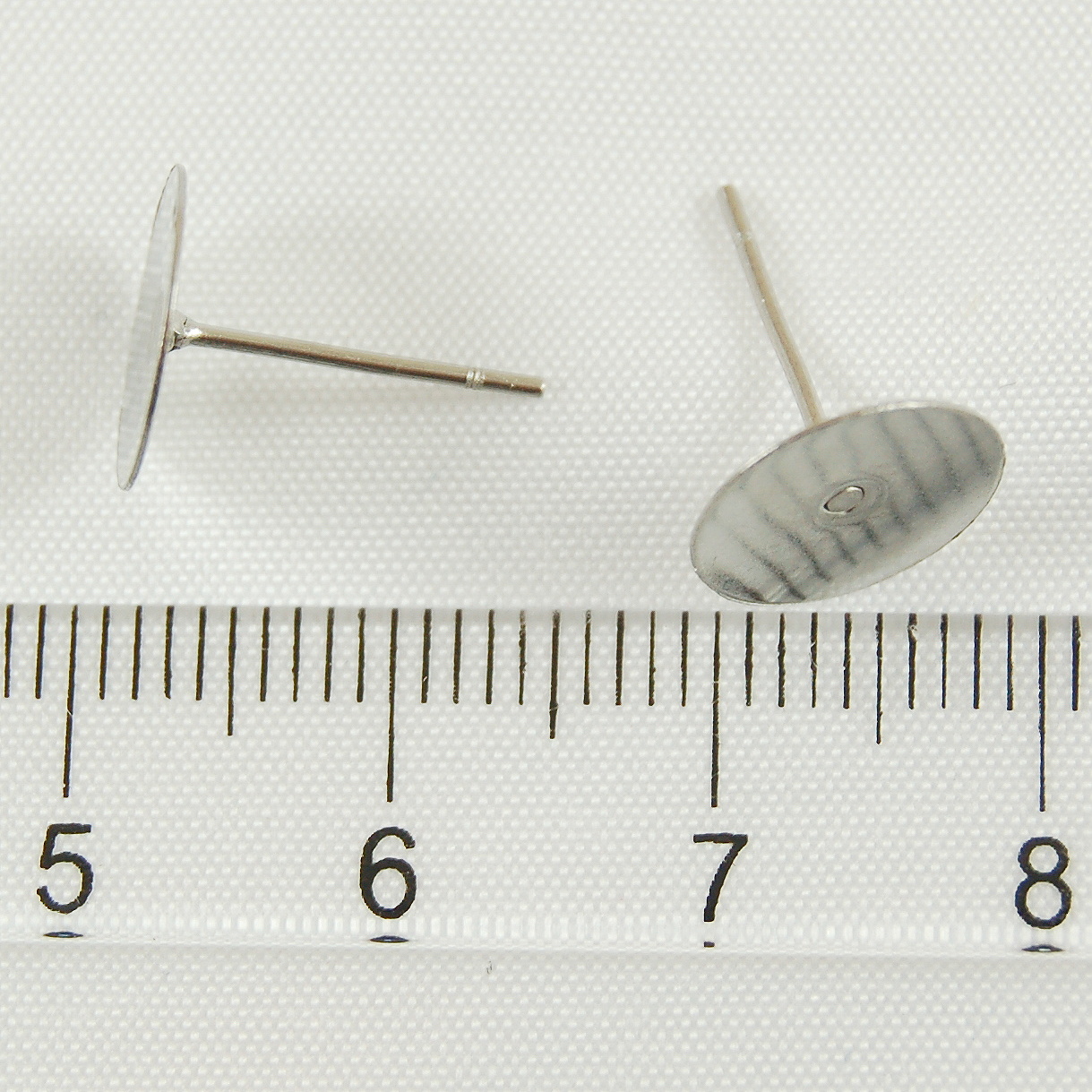 Puzety s ploškou 12mm z chirurgické oceli 50ks