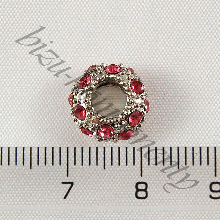 Kovový korálek s vlnkami