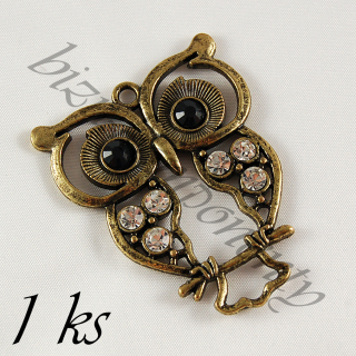 Velká obrýlená sova s černýma očima