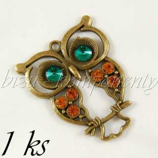 Velká obrýlená sova se zelenýma očima, bronzová barva