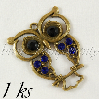 Velká obrýlená sova s tmavě modrými křídly, bronzová barva