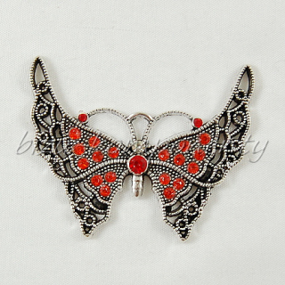 Velký krajkový motýl s oranžovými křídly, stříbrné barvy