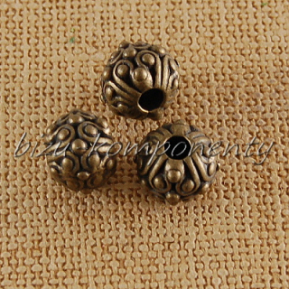 Kovový korálek, bronzová barva 11x9mm, 3ks